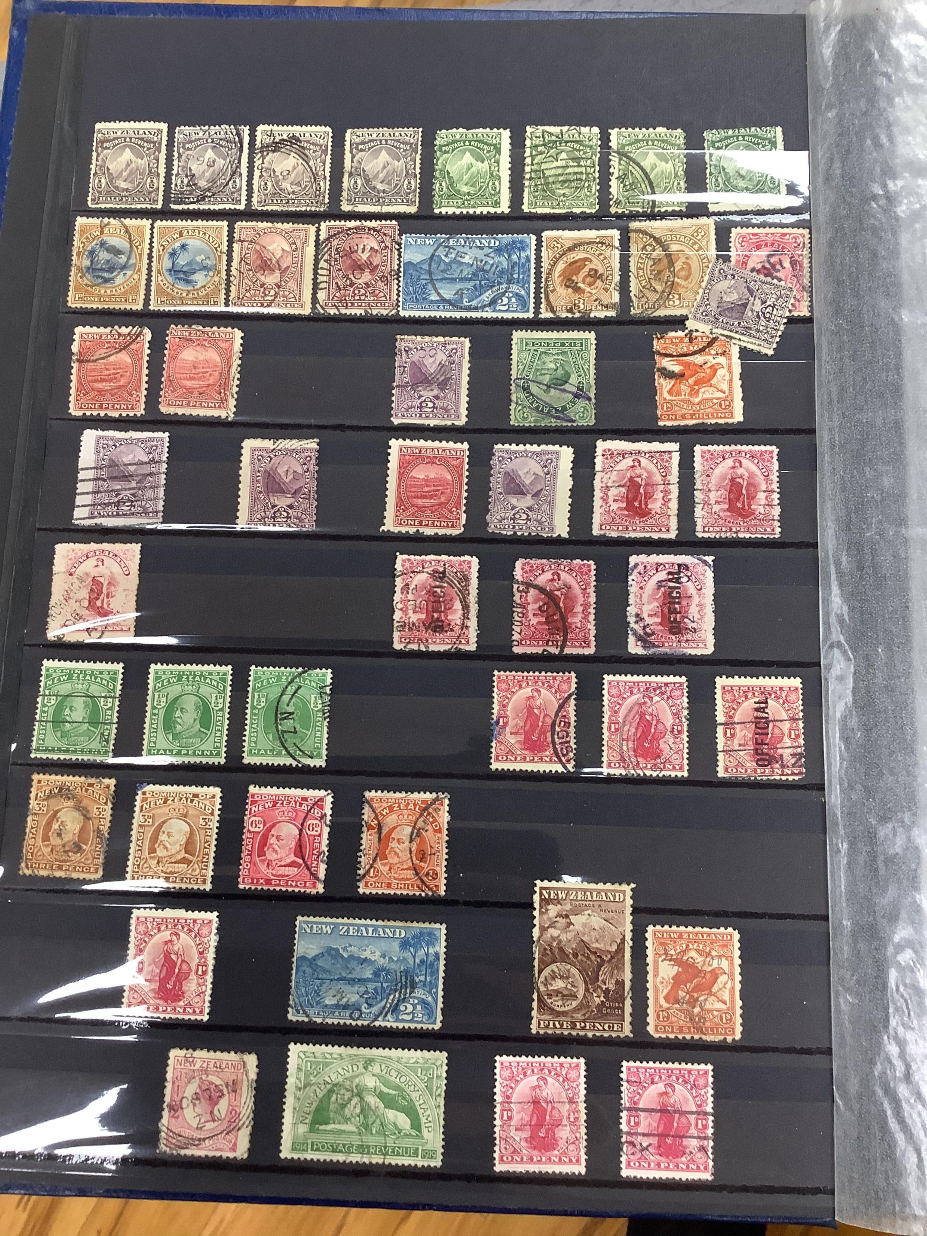 Four albums of stamps each: Holland, New Zealand, Borneo etc (4). Condition - mostly stamp marked.